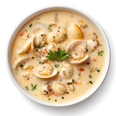 A delicious bowl of creamy clam chowder. The soup is garnished with parsley and pepper