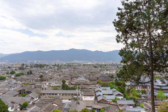 Panoramic view of traditional house of the old town Lijiang, China. Dayan, commonly called the Old Town of Lijiang. Look from Lion Hill.