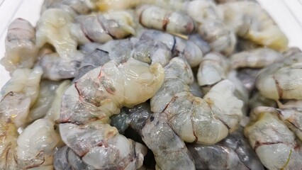 Close up of raw shrimps that has been peeled.
