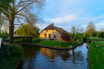 rural dutch traditional country small old town Giethoorn with canals, Netherlands scenery