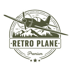 Retro plane flying over mountains and trees in a circular logo design icon
