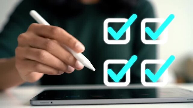 Close-up hand using stylus to check boxes on digital tablet screen, stock media video