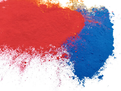 Red and blue holi powder splash isolated on transparent background png. Dual color gulal explosion with dynamic pigment dust particles for festive artwork
