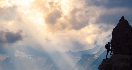 A climber scales a rocky mountain peak as the sun sets, casting a golden glow over the landscape...
