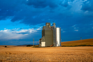 Lone Grain Silo in the Vast Rolling Wheat Fields of the Palouse, Washington State