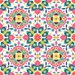 Fototapeta premium vector seamless repeating rangoli pattern in flat vector style. The design features symmetrical geometric shapes, floral motifs, peacocks, lotus flowers, and traditional oil lamps (divas).