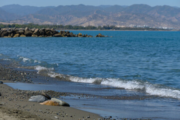 Sunlit Mediterranean Sea with Mountain View in Cyprus