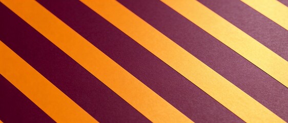 Diagonal stripes of orange and deep purple create a bold, graphic pattern with a modern feel
