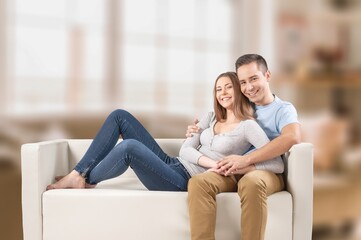 Obraz premium Happy young couple relaxing at home