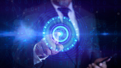 Obraz premium Businessman pressing virtual buttons in futuristic concept. Futuristic Touchscreen Interface with holographic world map display technology. Starting a business and a new life.