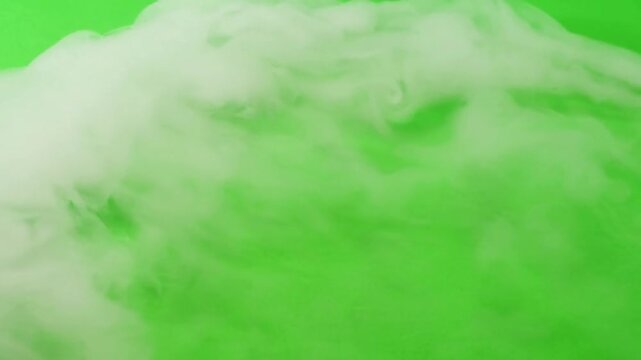 White Smoke Fog Floating and Dispersing on Green Screen Background