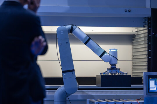 Robot arm automated factory packing system, Smart robot arm systems for innovative warehouse and factory digital technology . Automation manufacturing robot.