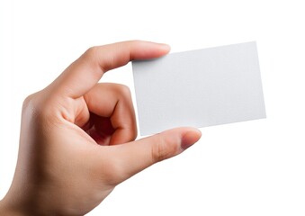 Fototapeta premium A hand holds a blank rectangular card, likely a business card, against a white backdrop