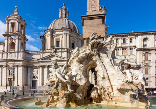 Fountain of Four Rivers (Fontana dei Quattro Fiumi) and Sant'Agnese in Agone church on Piazza Navona square, Rome, Italy