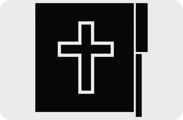 Obraz premium A black book with a white cross on the cover