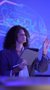 Computational neuroscientist analyzing digital brain connectome data via tablet interface. AI researcher monitoring neural network synaptic simulation metrics.