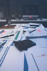Above table with finance papers, graphs and big data during teamwork meeting with accounting or marketing team discussing budget, strategy or growth development. Closeup of SEO team doing research