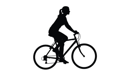 Obraz premium Woman riding a bicycle in a striking black silhouette