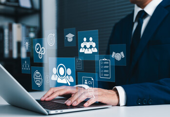 Recruitment and HR management concept, business professional using laptop to analyze candidates,...
