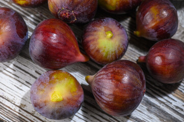 Obraz premium Ripe Cypriot Fig on Rustic Wooden Table