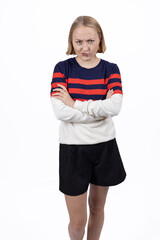 Full length portrait of young woman in striped sweater posing