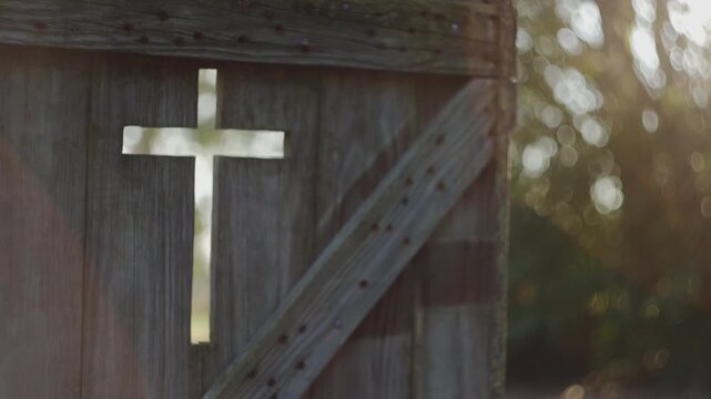 wooden church door with a cross