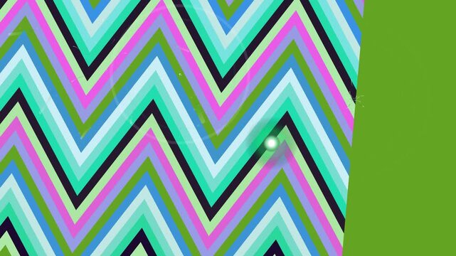 Vibrant multicolored chevron pattern on green background.