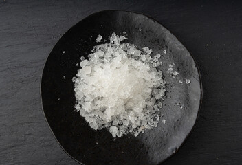 Dead sea salt pile, white crystals for body spa, sodium chloride similar to crushed ice, spa scrub