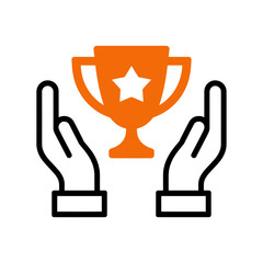 Obraz premium Two hands holding an orange trophy cup with a star on it