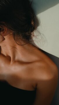 Graceful depiction of Latin woman illuminated by warm light