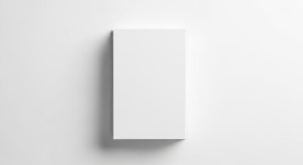 Naklejka premium Blank white box on a plain background, empty packaging template for product display or branding purposes.
