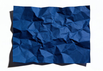 Crumpled blue paper texture with deep folds and shadows on white surface