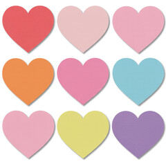 Nine colorful heart shaped sticky notes in different pastel shades pink