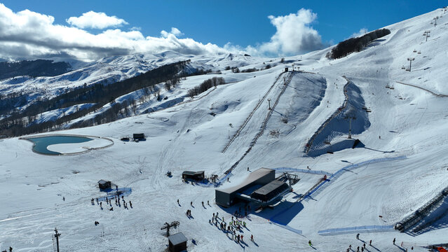 Aerial drone of recently renovated snow center of Anilio Perched on the top of Pindus, with the comparative advantage of easy and direct access via the Egnatia Motorway, covered in snow, Epirus, Greec