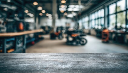 Interior of a well-lit motorcycle repair workshop with tools and equipment.