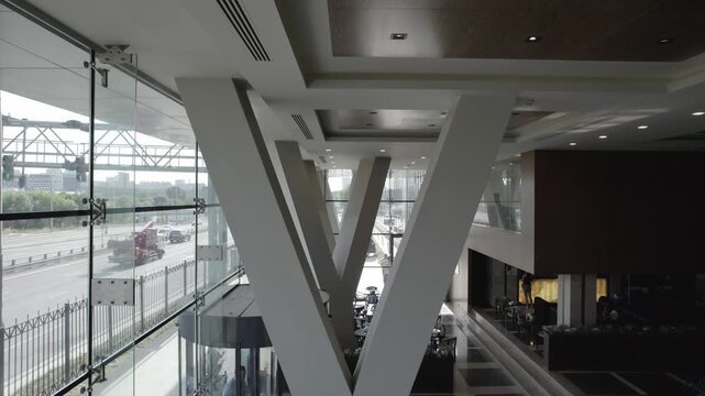 Forward drone movement inside office atrium