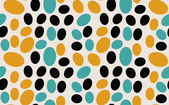 Seamless pattern of scattered oval shapes in mustard yellow black and teal cream background