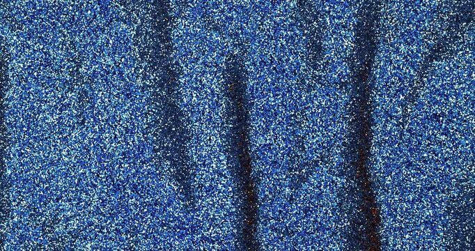 Texture astratta : polvere di glitter luccicante in acqua con aggiunta di solvente