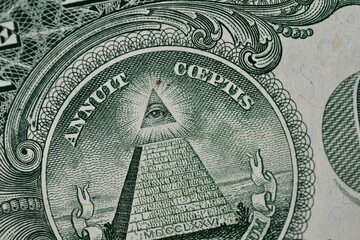 Macro View of the All-Seeing Eye on a US One Dollar Bill Pyramid