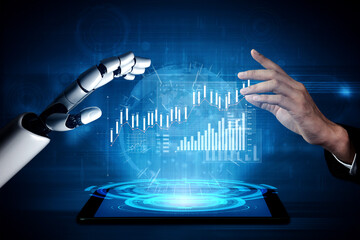 Conceptual image showing a robotic hand reaching towards a human hand above a digital tablet displaying data visualizations. It illustrates the collaboration between technology and humanity. Scalp
