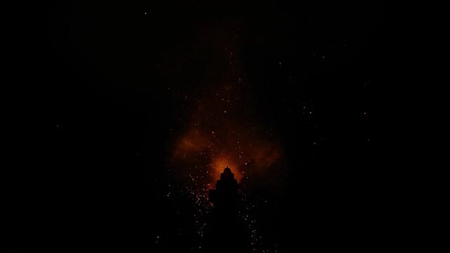 Explosion Fireball Bursting at Night with Sparks