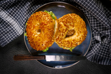 Breakfast sandwich on a bagel.