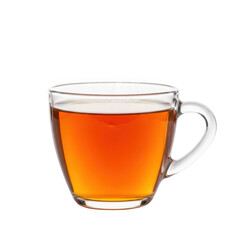 A glass mug of amber colored tea on a white background