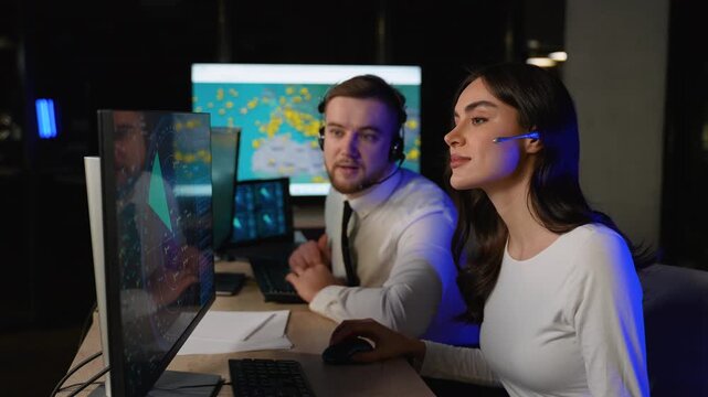 Air traffic controllers collaborating in control center room