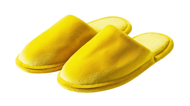 Bright yellow velvet house slippers isolated for home comfort and spa relaxation.

