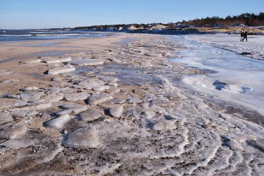 Frozen beach of Baltic Sea around breakwater of Jamno Canal, Mielno. Western Pomerania, Poland