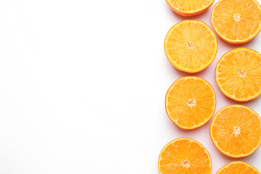 Fresh juicy tangerines on white background, flat lay. Space for text