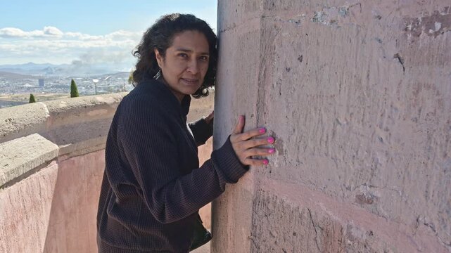 Close-up of Mature Hispanic Woman Relaxing at Scenic City Lookout