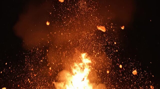 Massive fiery explosion bursting upwards with glowing debris and sparks, perfect for action movie VFX or dramatic event openers.