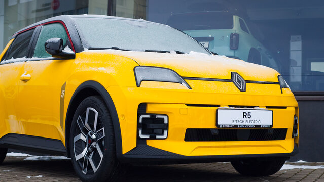 Riga, Latvia - January 25, 2026: New yellow Renault R5 car near the auto center